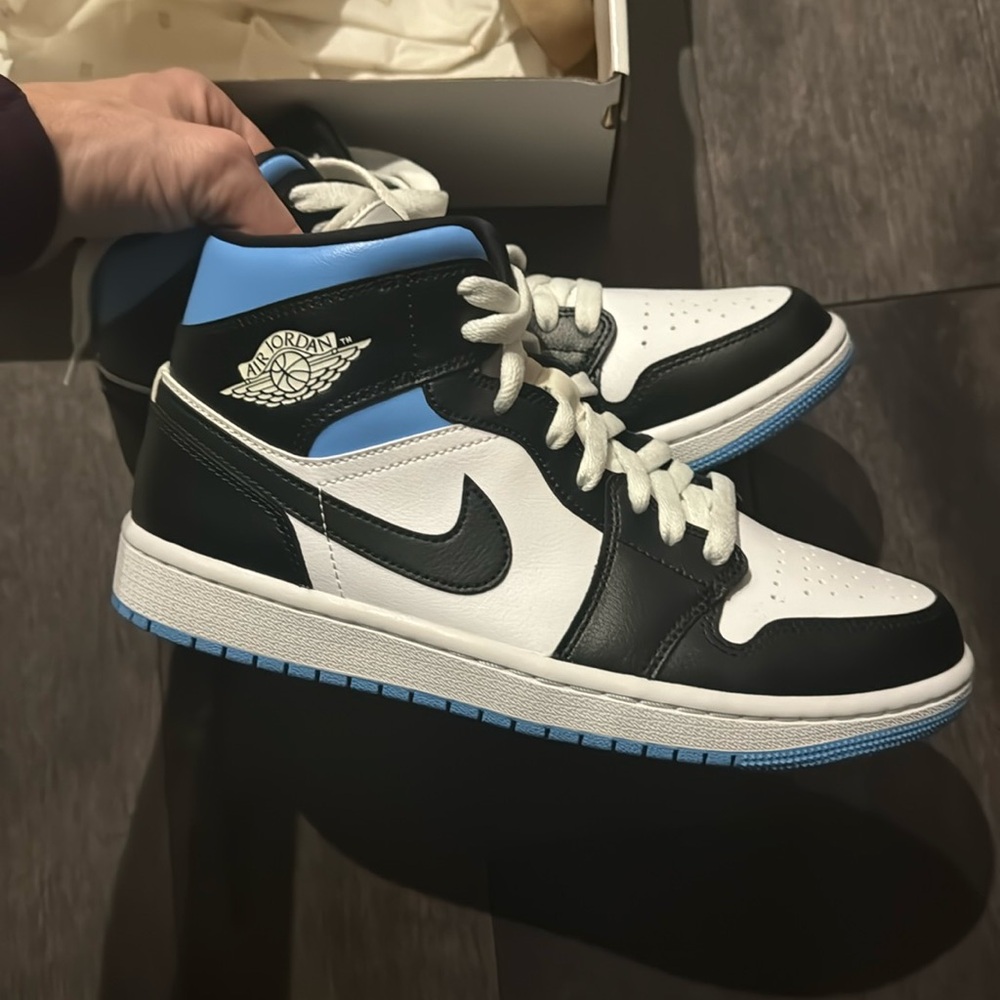 Brand new high top Air Jordans Nike sneaker size 7.5 m 9 w black white and blue
